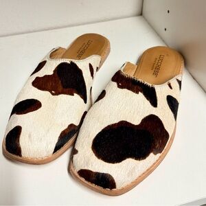 Lucchese Cowprint Haircalf Slip-On Mules in White & Brown